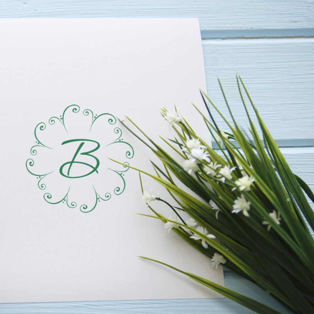 Decorative monogram rubber stamp with letter B floral circle design for custom stationery, weddings, and craft projects.
