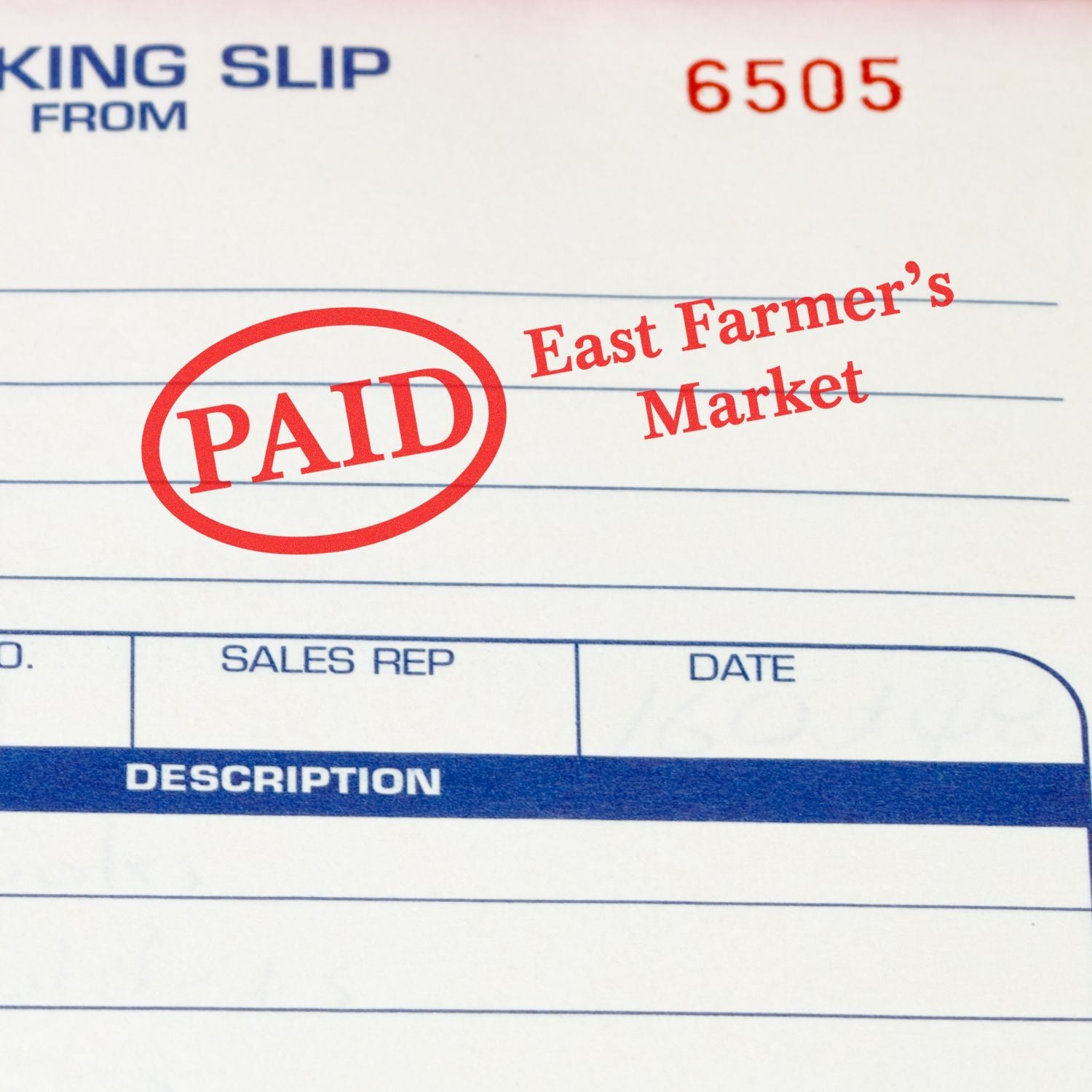 PAID stamp on invoice for East Farmer's Market, indicating paid status and completed payment in sales rep and date record form.