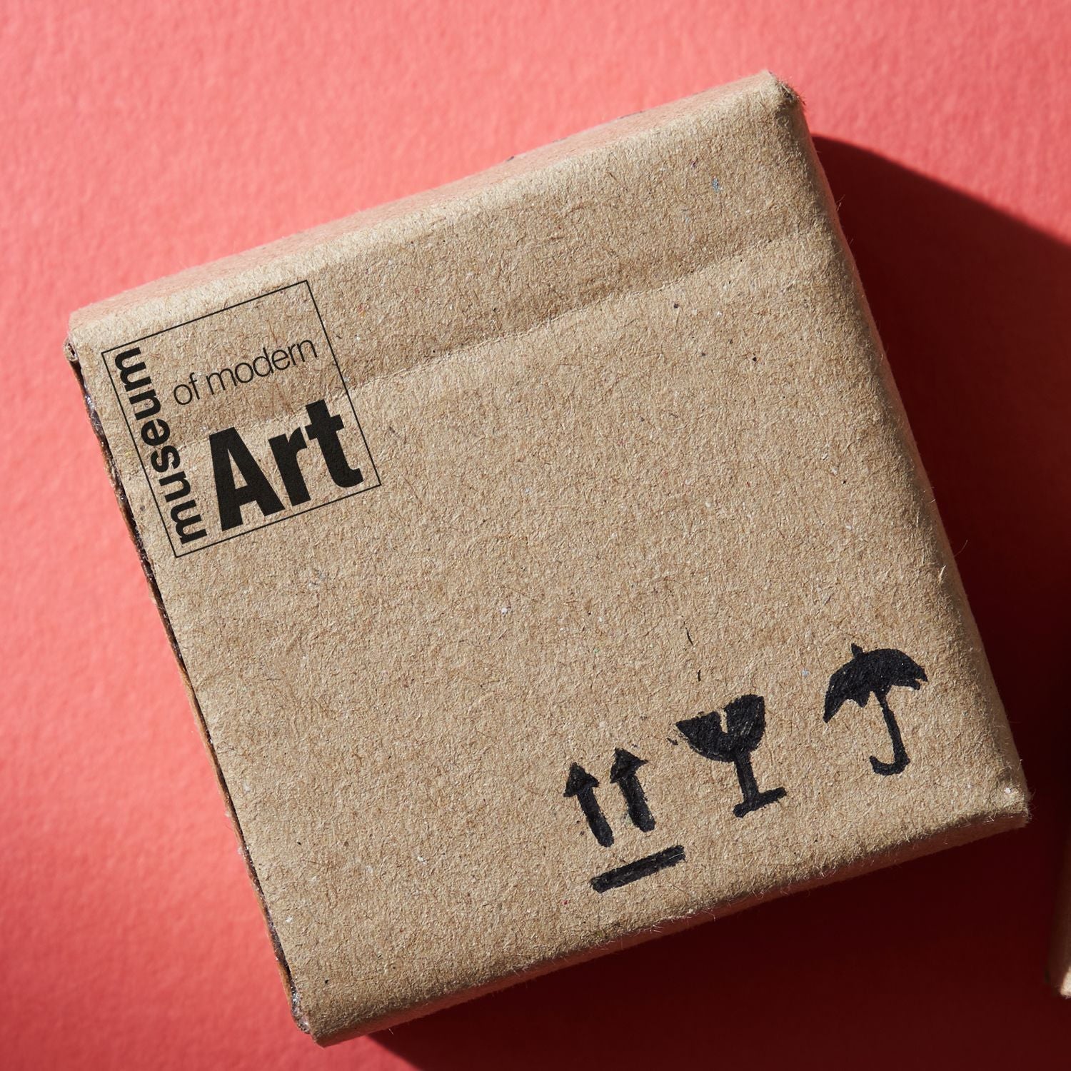 Close-up of a vintage Museum of Modern Art (MoMA) book cover, showcasing modern art history.