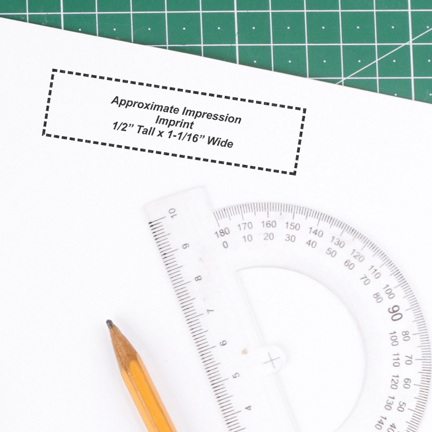 Measurement of imprint size: approximate 1/2-inch tall by 1-1/16-inch wide text layout on paper with protractor and pencil template.