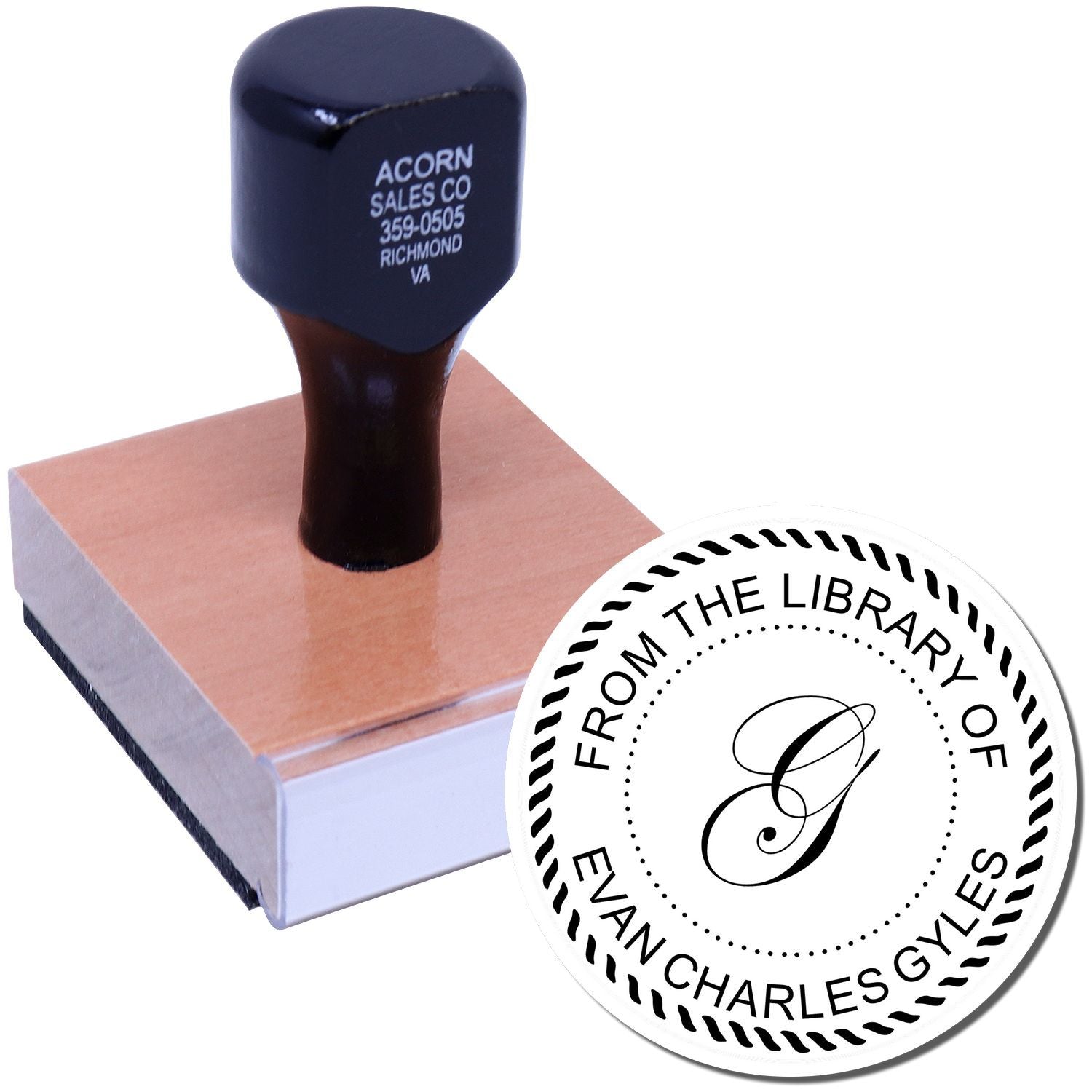 Custom rubber book stamp with wooden handle and From the Library of Evan Charles Gyles design.