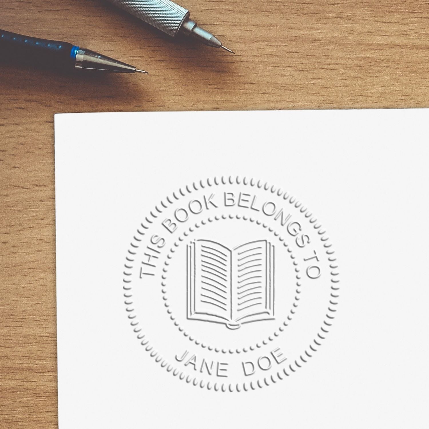 Gold Gift Desk Book Embosser In Use 1