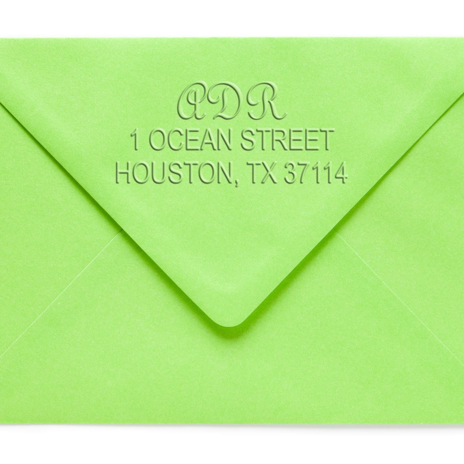 Lime green embossed envelope addressed to ADR, 1 Ocean Street, Houston, TX 37114.