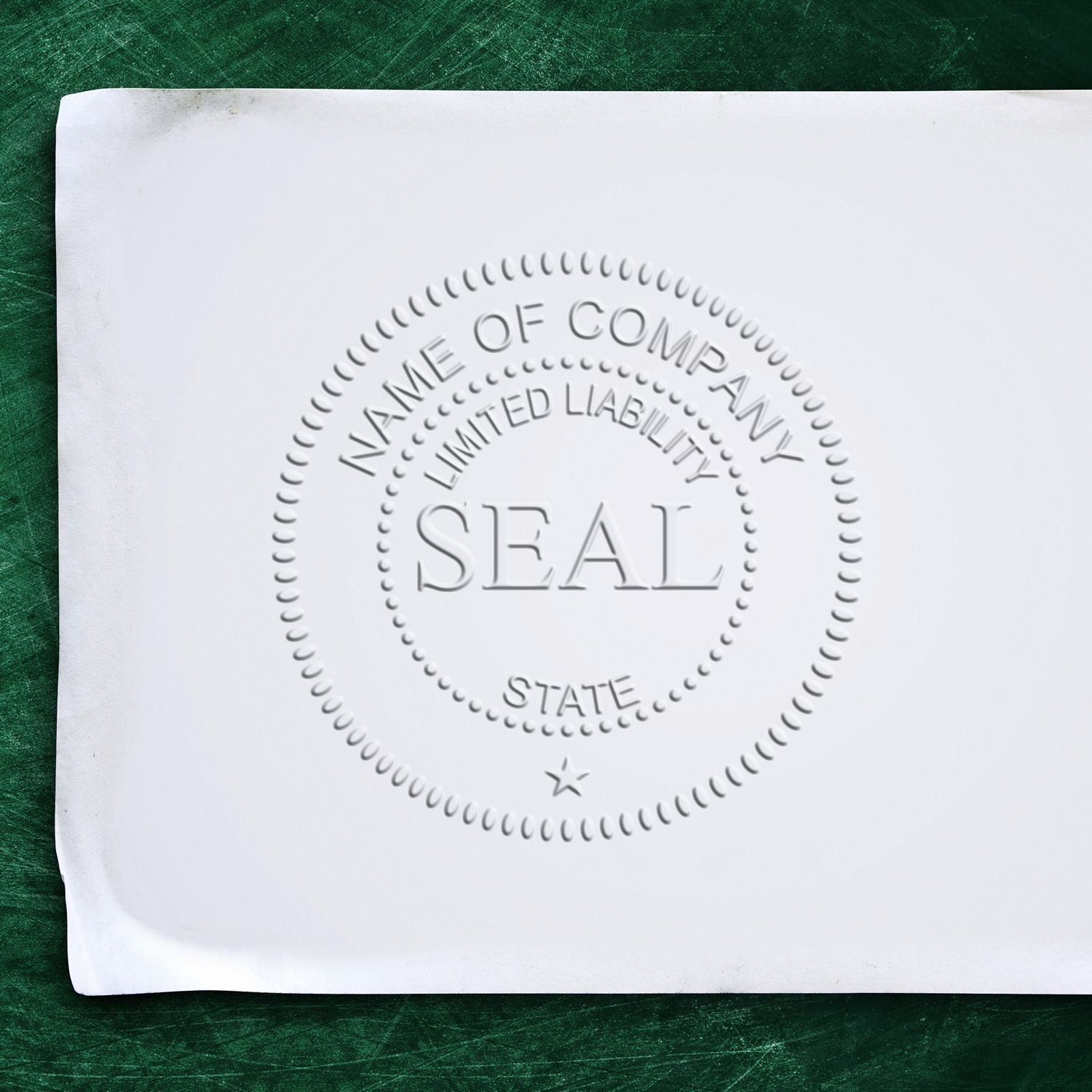 Embossed company seal on white document, featuring Name of Company, Limited Liability, and State on a green background.