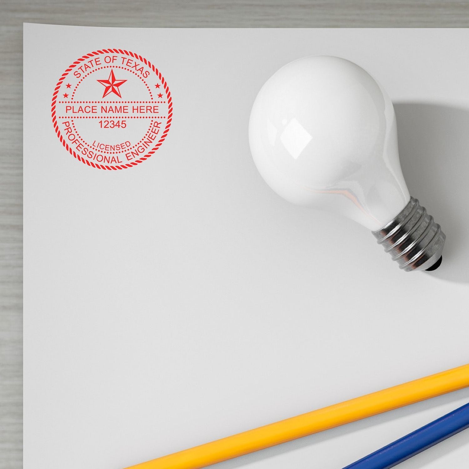 Blank engineering letterhead with Texas licensed professional engineer stamp, light bulb, and pencils.