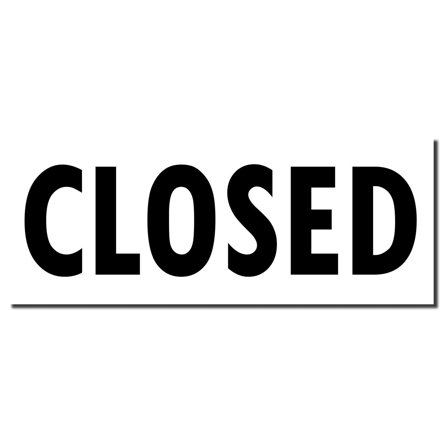 Bold black CLOSED lettering on a white shop sign indicating the store is closed for business hours.