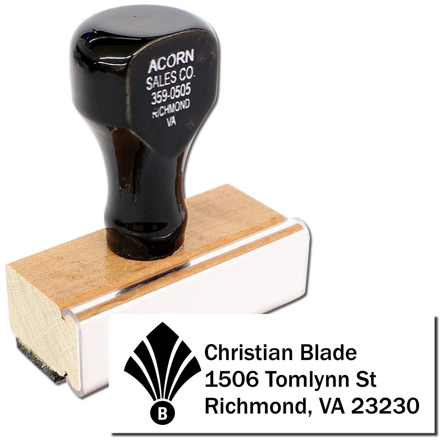 Custom rubber address stamp for Christian Blade with logo, Richmond, VA 23230, shown on a wooden stamp block.