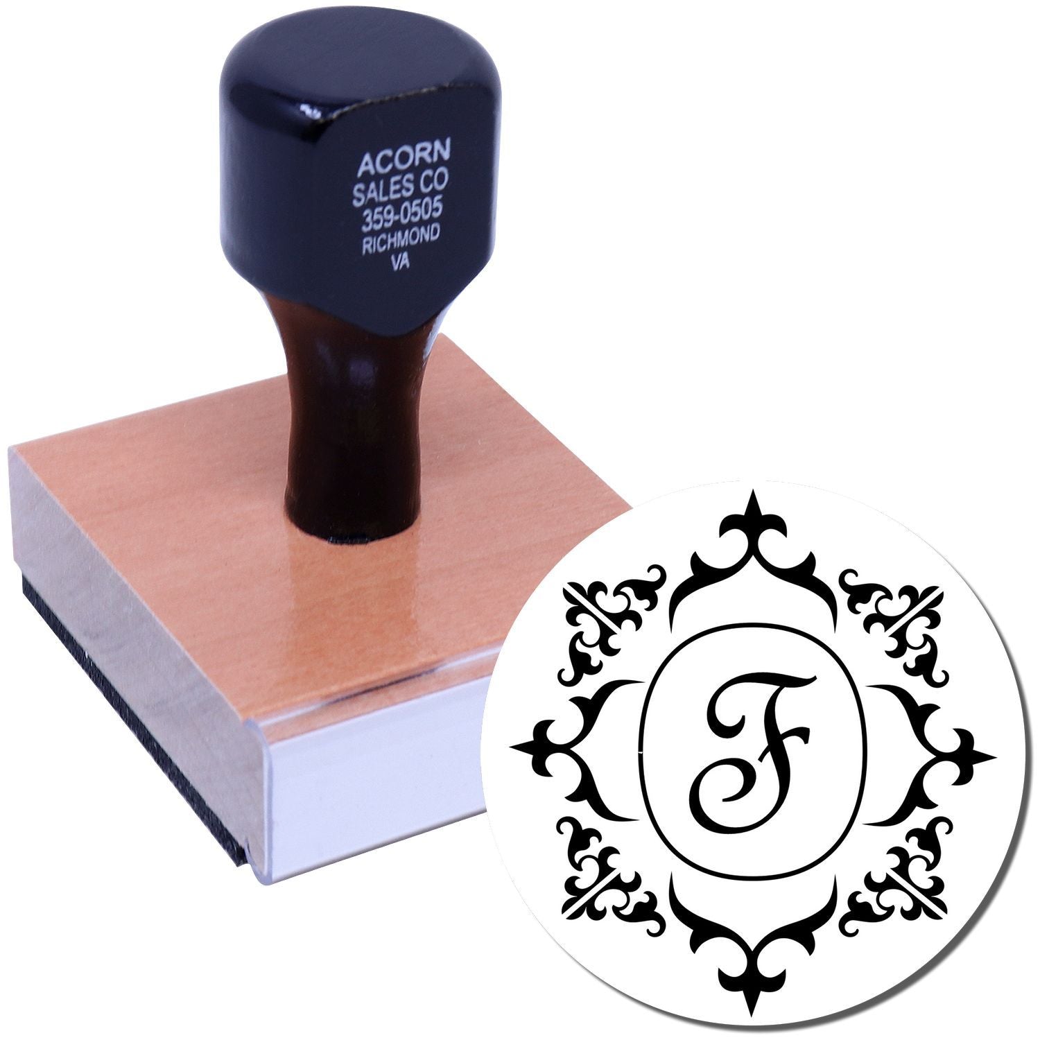 Custom monogram rubber stamp with decorative letter F design for personalized stationery and branding.