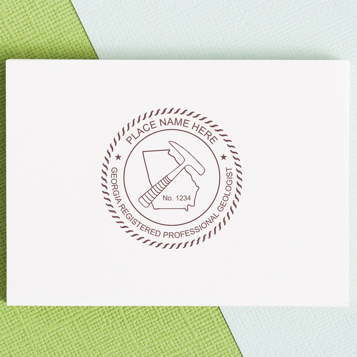 Georgia Registered Professional Geologist logo on white card with custom place name and hammer over Georgia outline.
