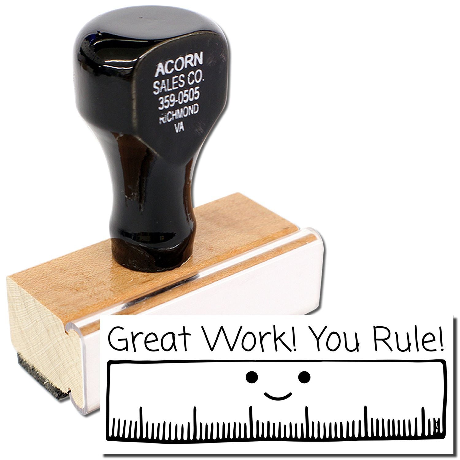 Acorn Sales Co. black rubber stamp on wooden block beside ruler, with Great Work! You Rule! praise message.