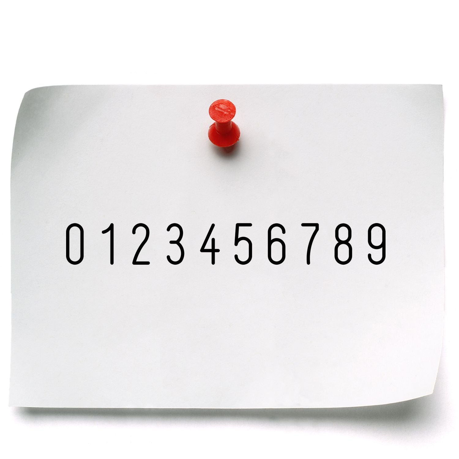 Close-up of a red-pinned number chart displaying digits 09, used for math learning, counting, and number recognition.