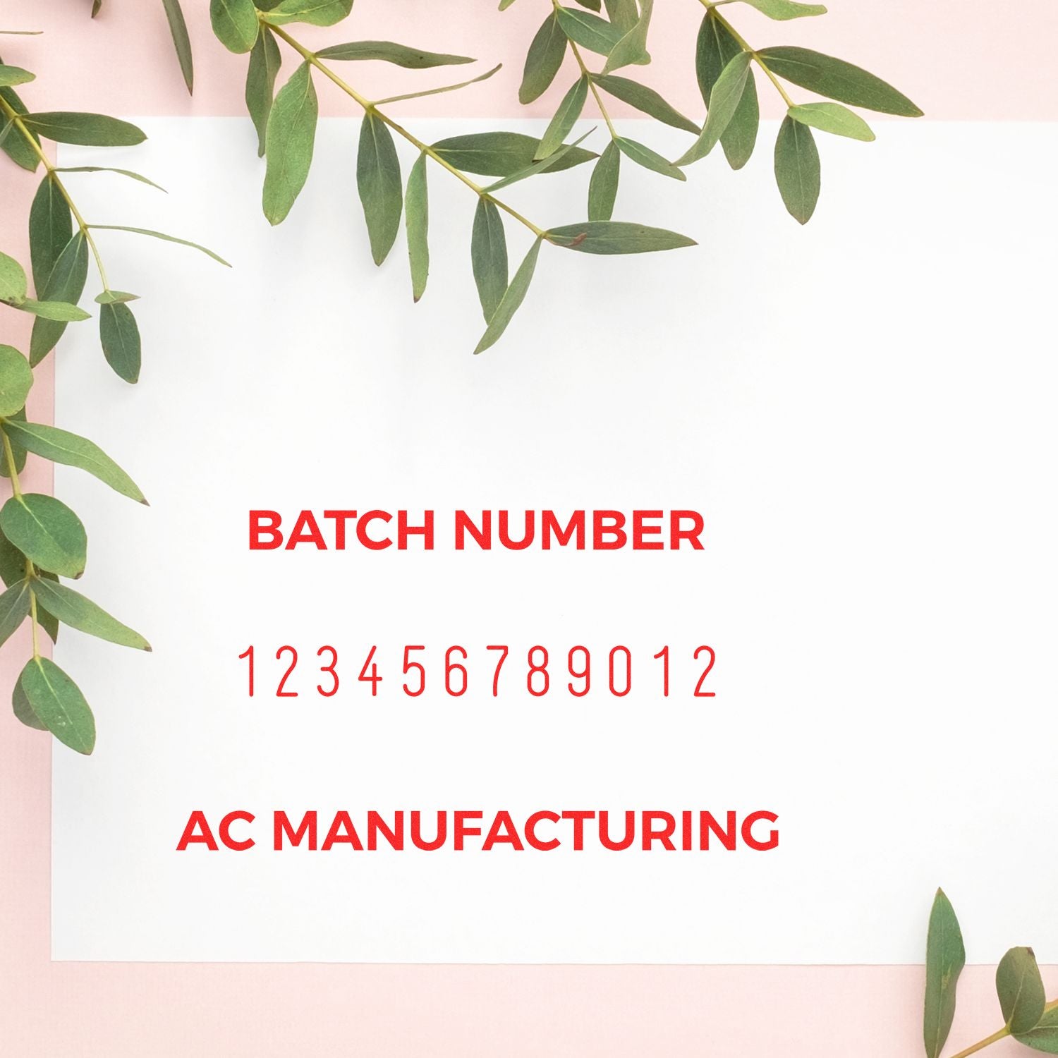 AC manufacturing batch number 123456789012 on a leaf-themed design background for production traceability.