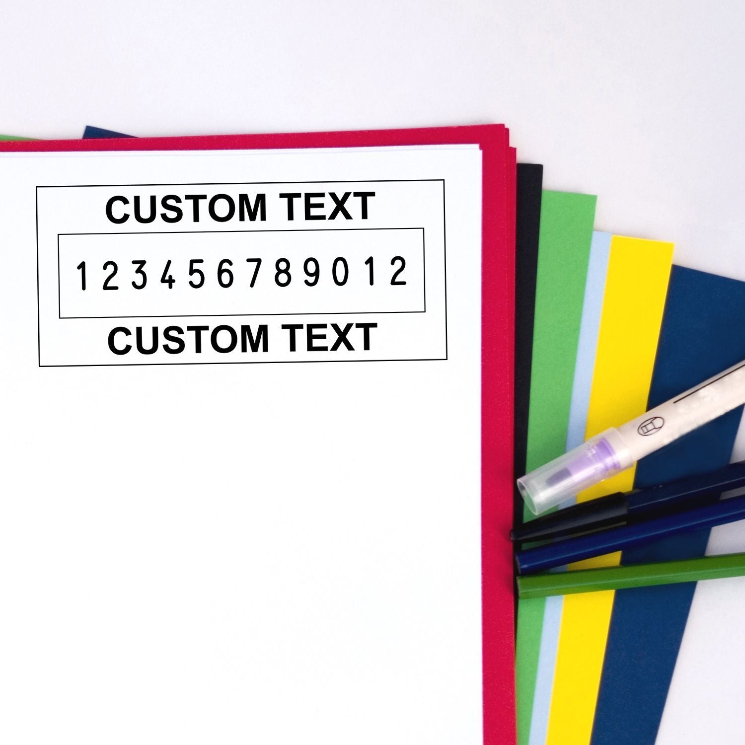 Custom text stationery card with printed number sequence, placed among colorful binders and folders for personalized printing.