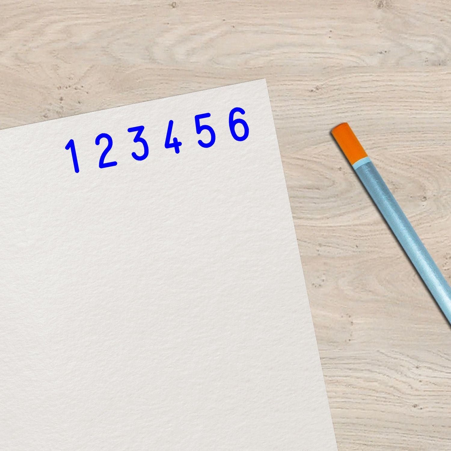 Math practice sheet with handwritten number sequence 1 to 6 and pencil on desk, showing counting and learning basics for kids numeracy.