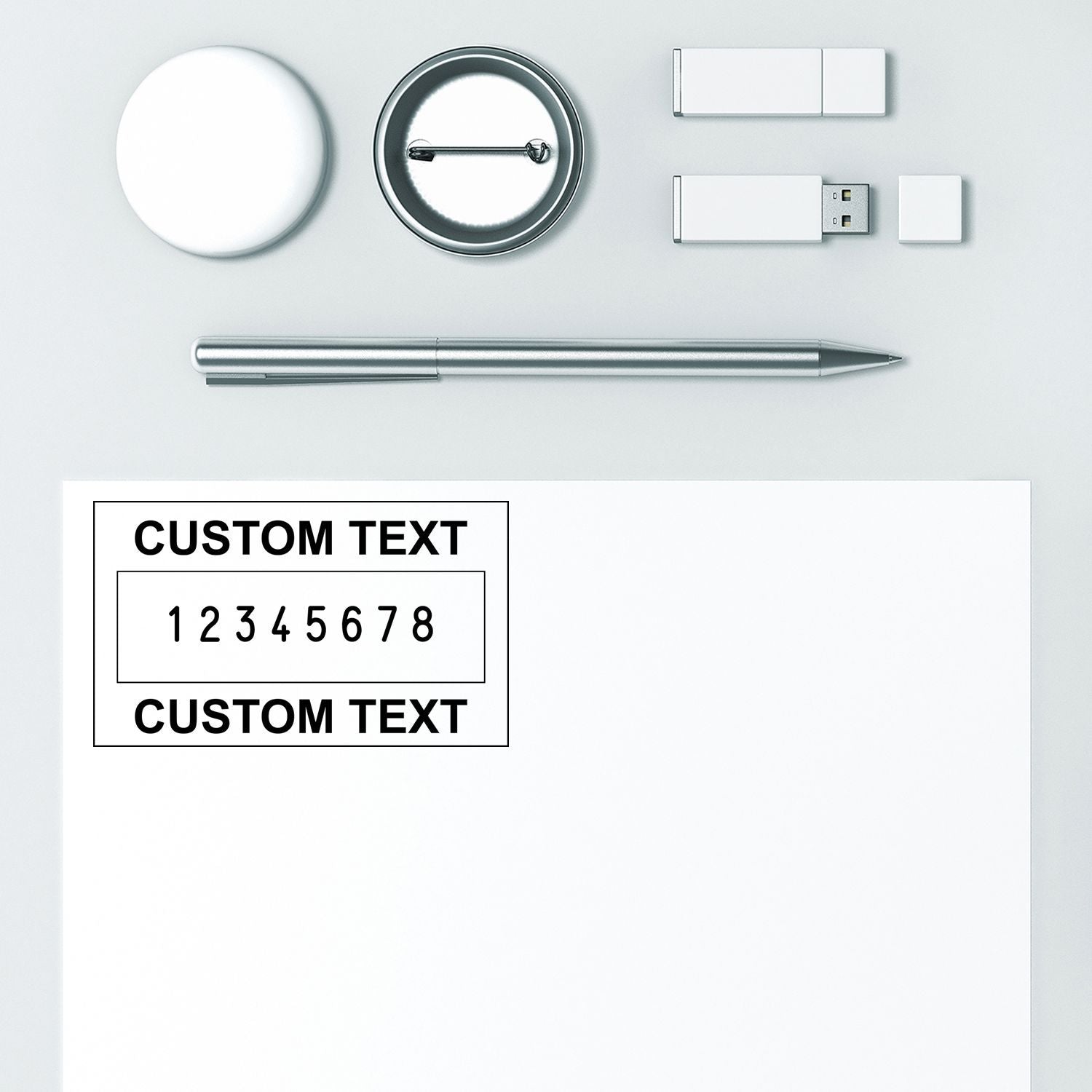 Office flat lay with magnifying glass, pen, USB drive and clipboard showing custom text and numbers for marketing or templates