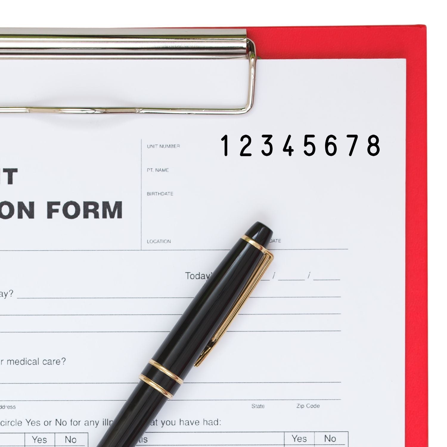 Medical patient intake form with pen and clipboard, highlighting unit number for accurate patient information and healthcare registration.