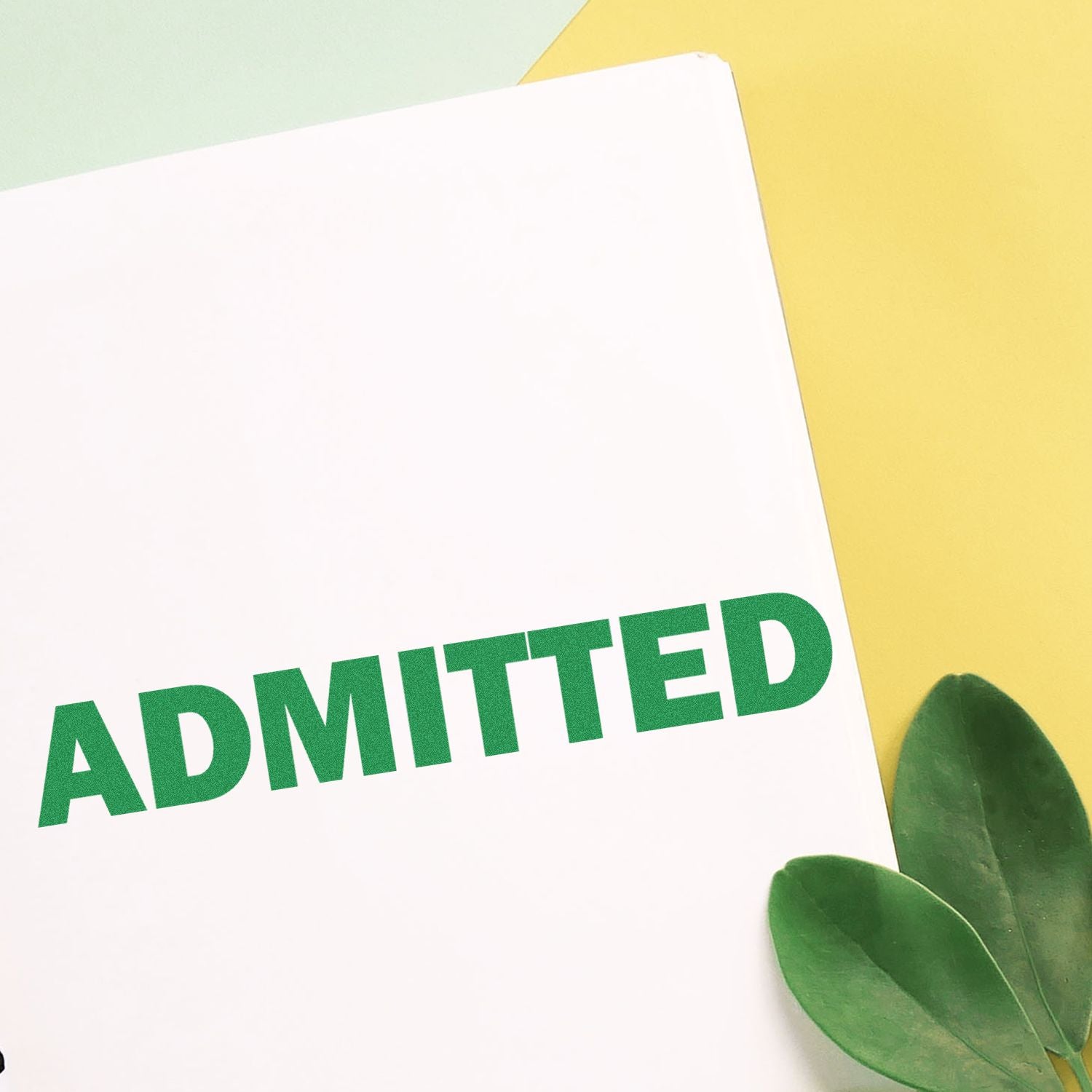 Admission confirmed card reading Admitted with fresh green leaves for a welcoming hospital or school announcement.