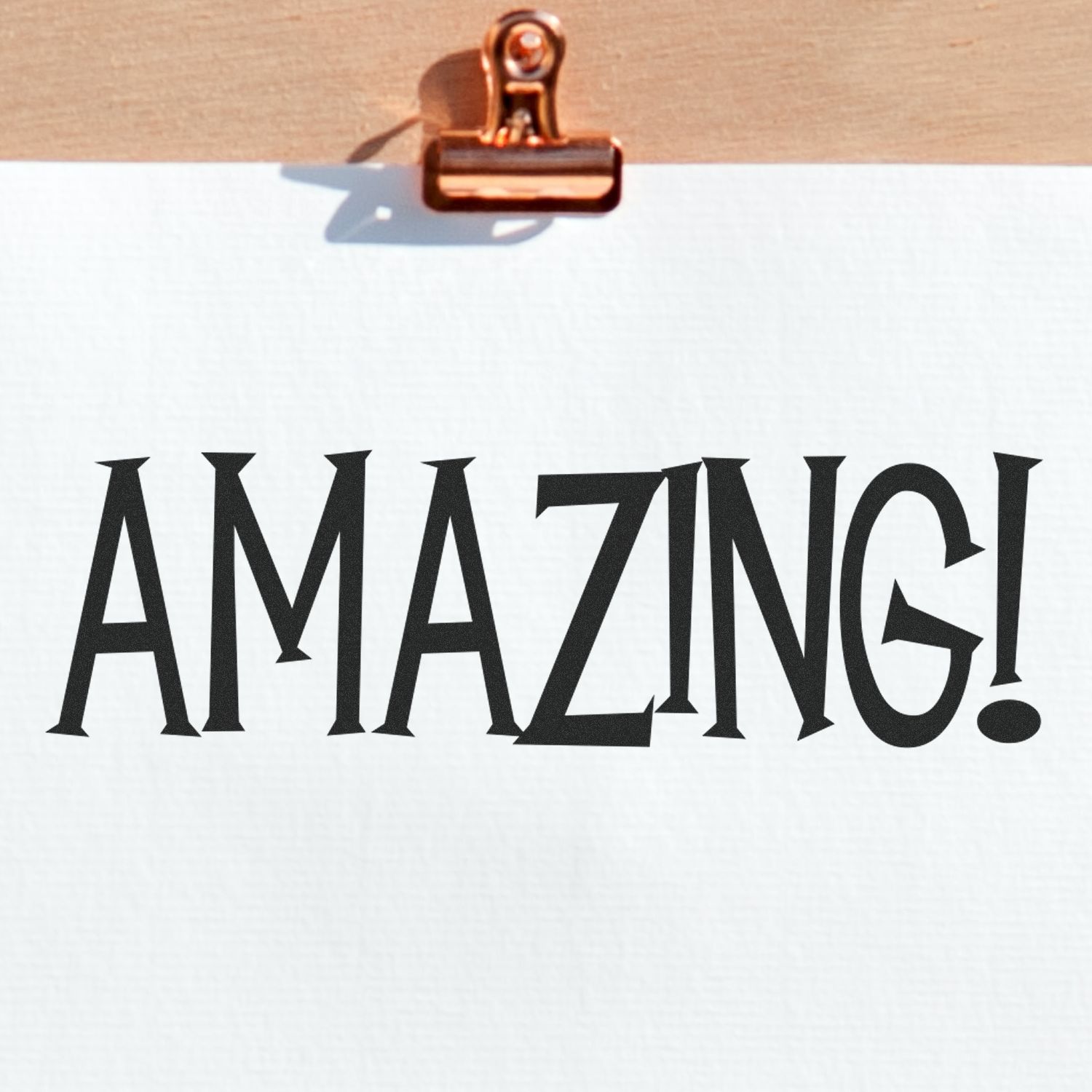 AMAZING! bold promotional text with spotlight clip on white background for attention-grabbing design