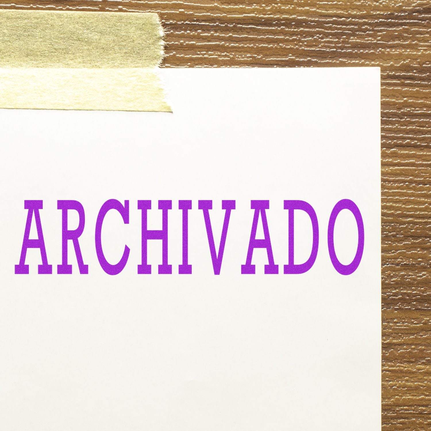 ARCHIVADO purple title on white document label against brown wood grain background, marking stored archived files.