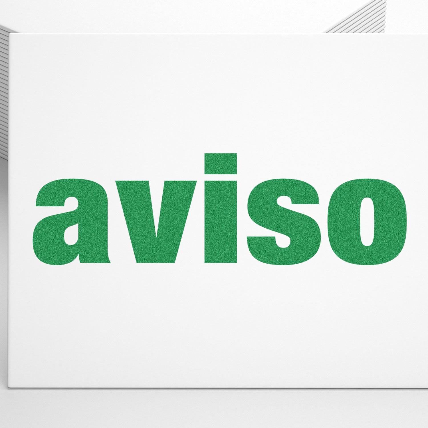 AVISO sign on a white wall with green lettering, indicating an informational warning message.
