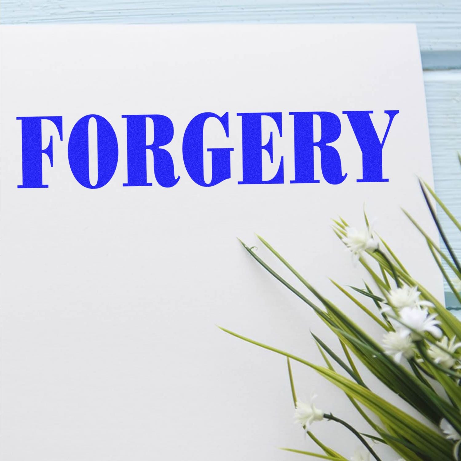Blue FORGERY title on white paper with green leaves and white flowers in the corner
