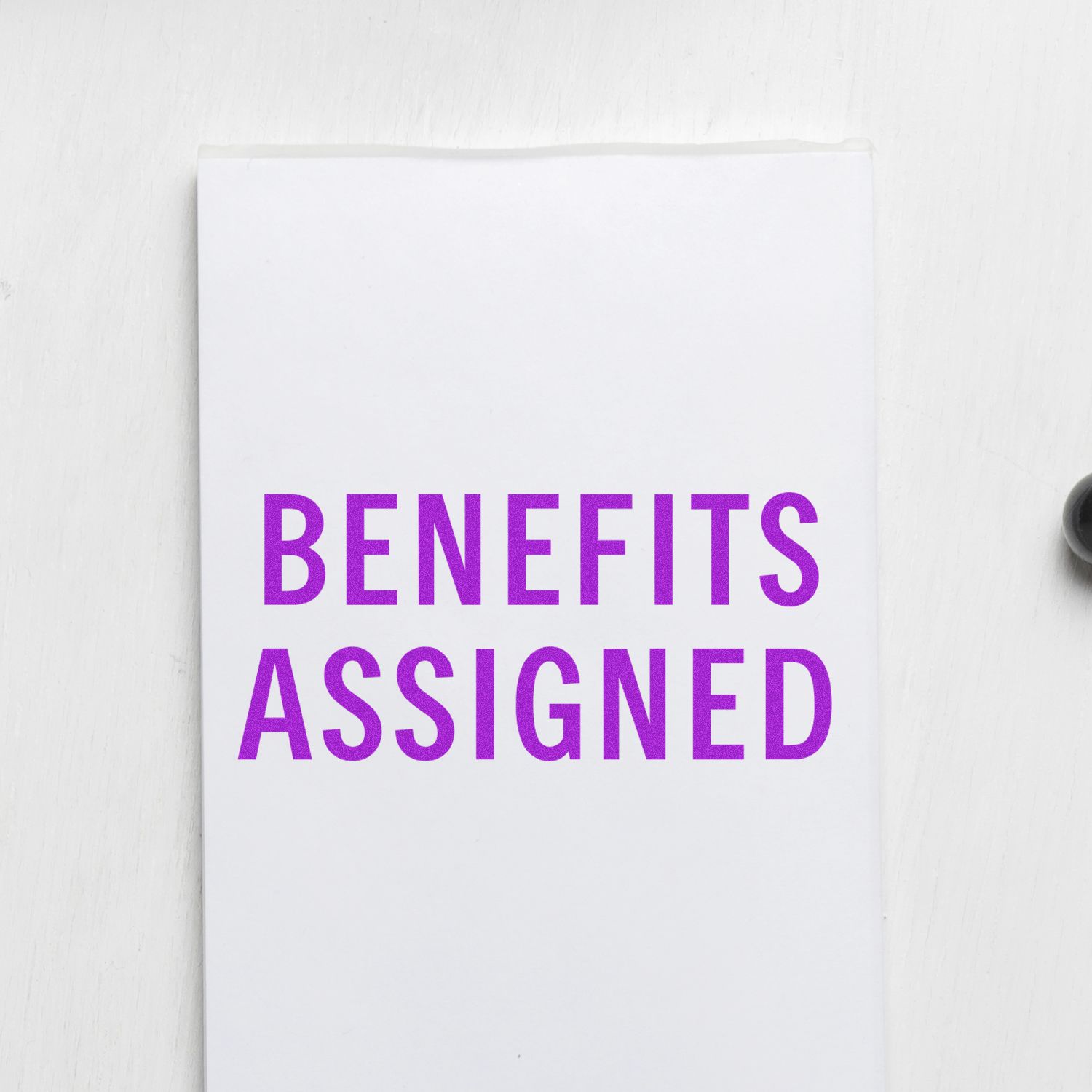 Benefits assigned statement on a white document page, highlighting employee benefits allocation and HR compensation details for management.