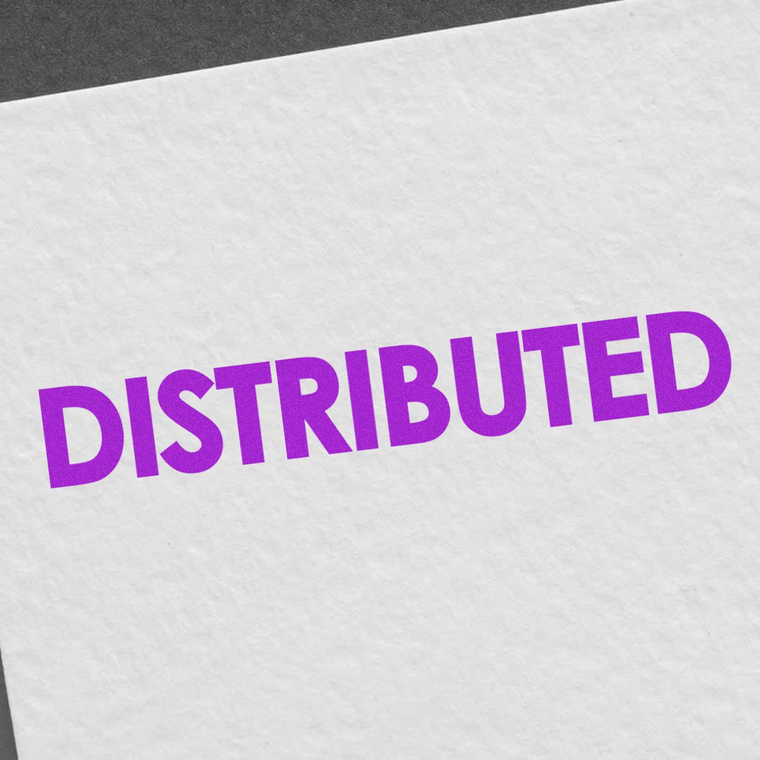 DISTRIBUTED wordmark graphic in purple on textured white background, promoting distributed systems and technology.