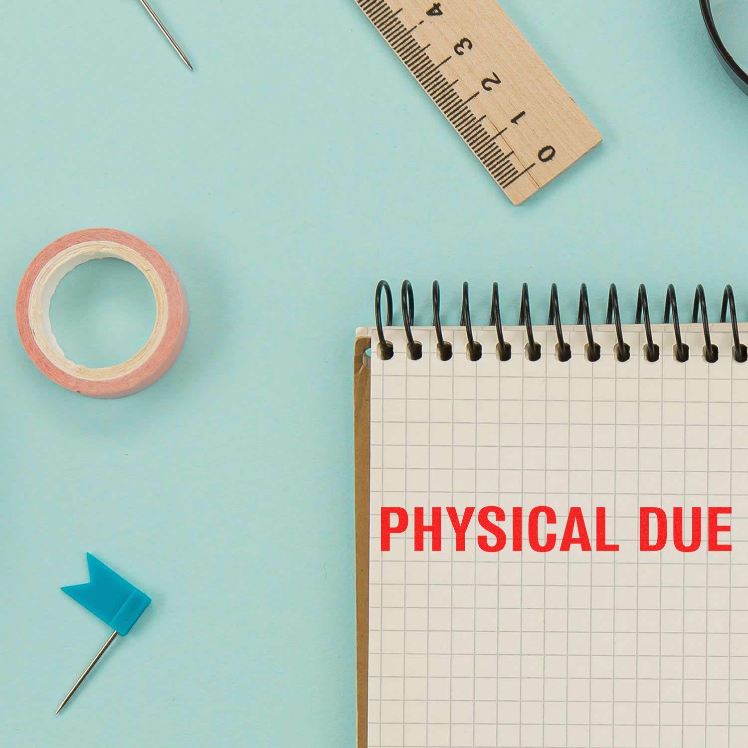 Physical due reminder with calendar notebook, ruler, pushpins and needles on blue backgroundhealth check scheduling concept.
