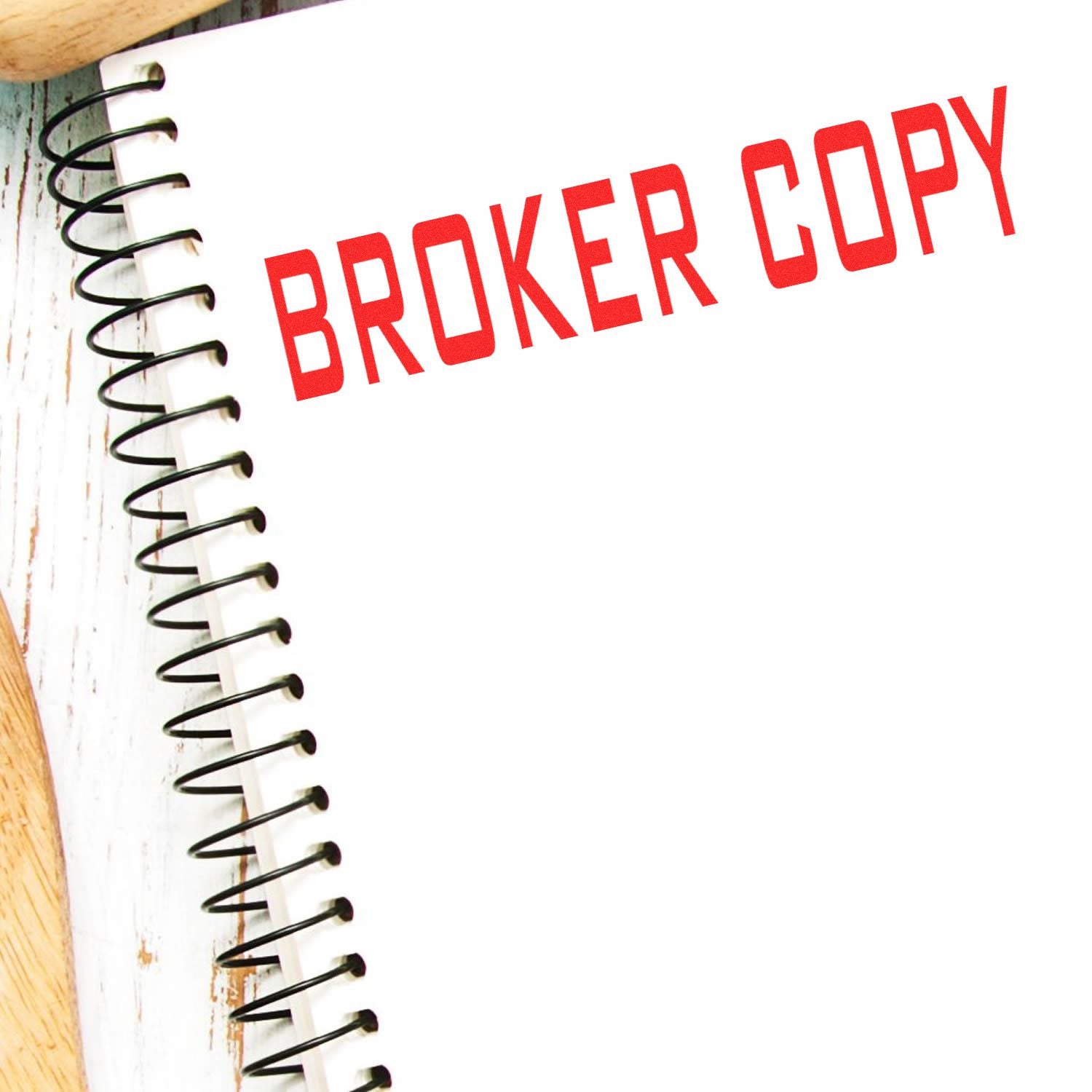 Brinker Capital branding on a spiral notebook page with red BRINKER text for investment services promotion.