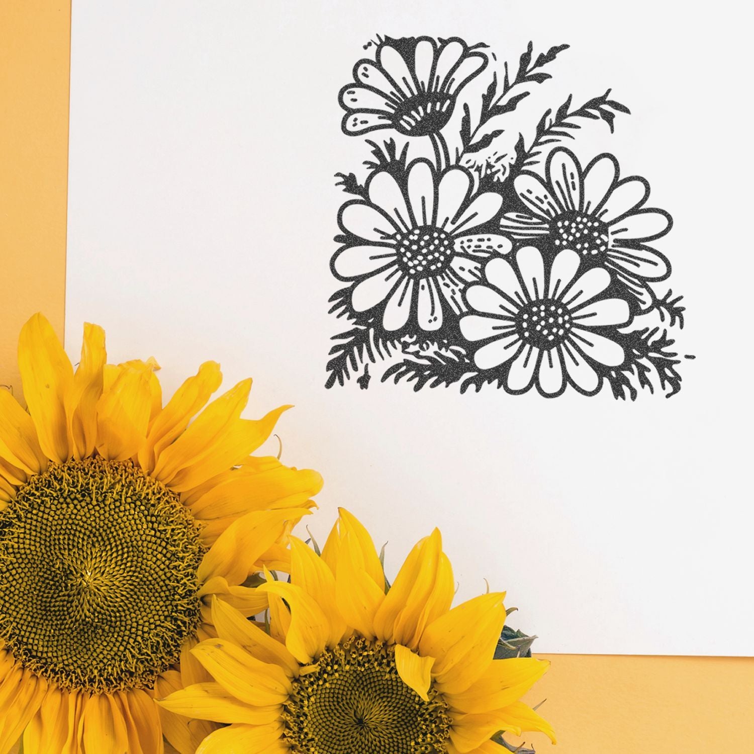 Bright yellow sunflowers with a black floral line drawing on a white background, modern botanical art print.