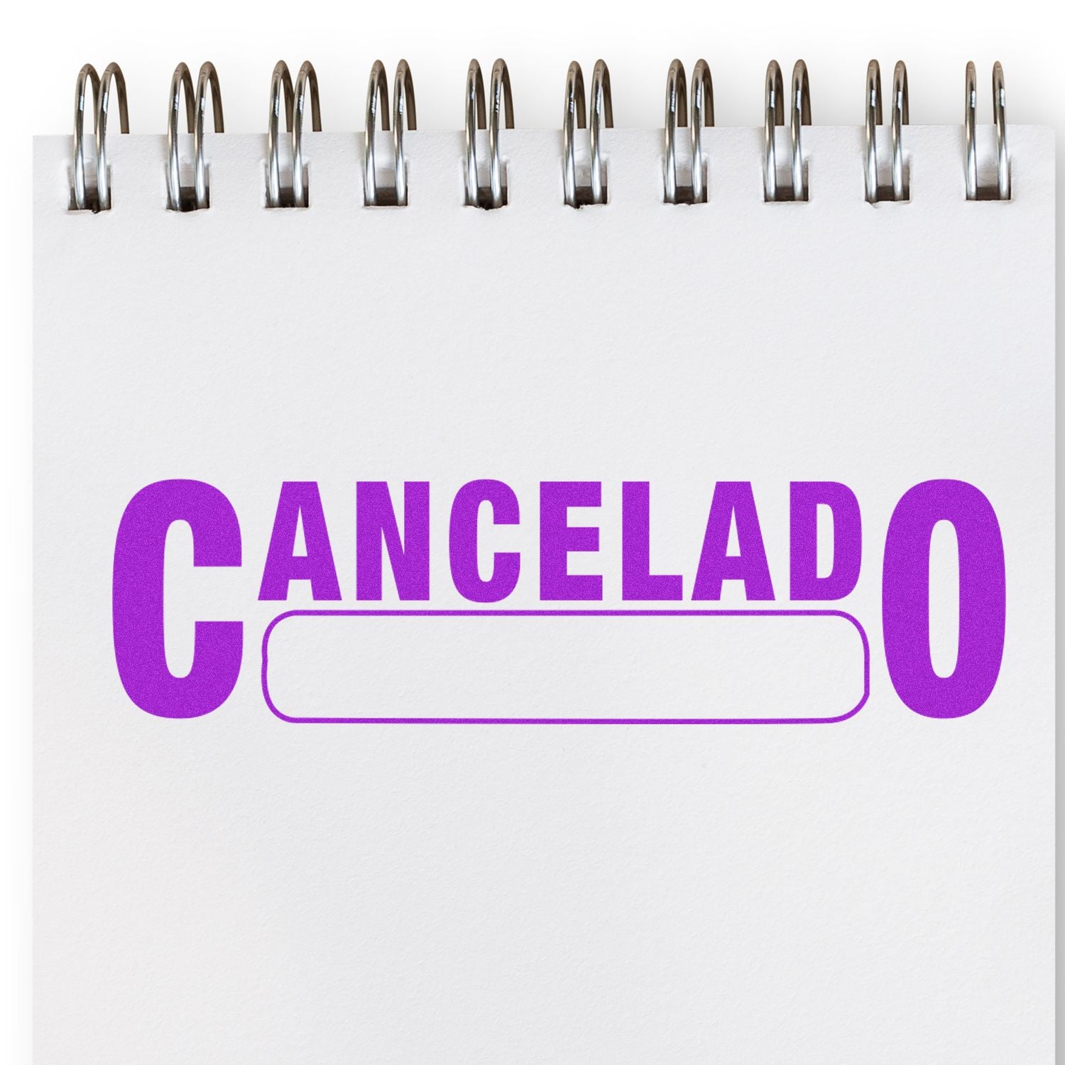 Purple CANCELADO stamp with blank field on white background, featuring binder-like clips, indicating a canceled order or payment.
