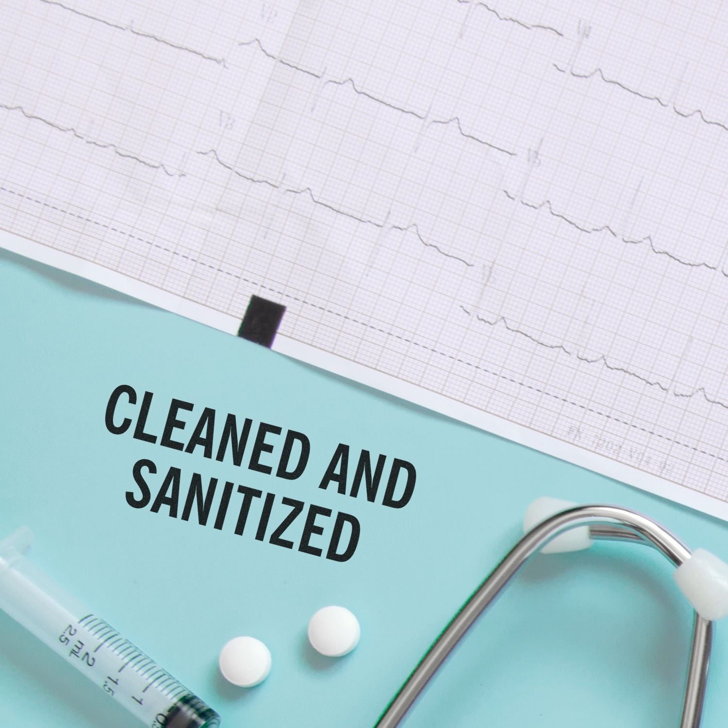 Cleaned and sanitized medical equipment with ECG chart, stethoscope, syringe, and pills on a clinical background