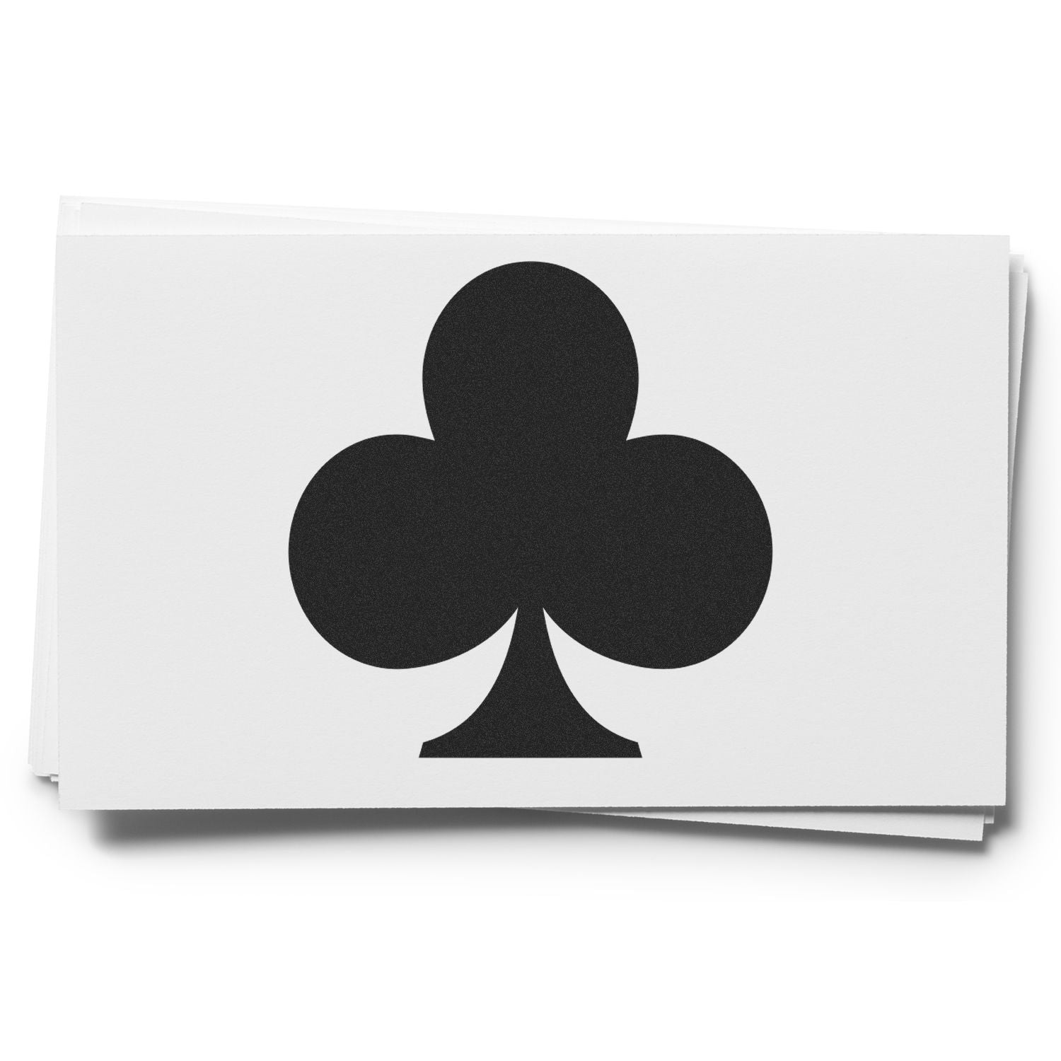 Black clubs suit symbol on stacked white playing cards, isolated on white background.
