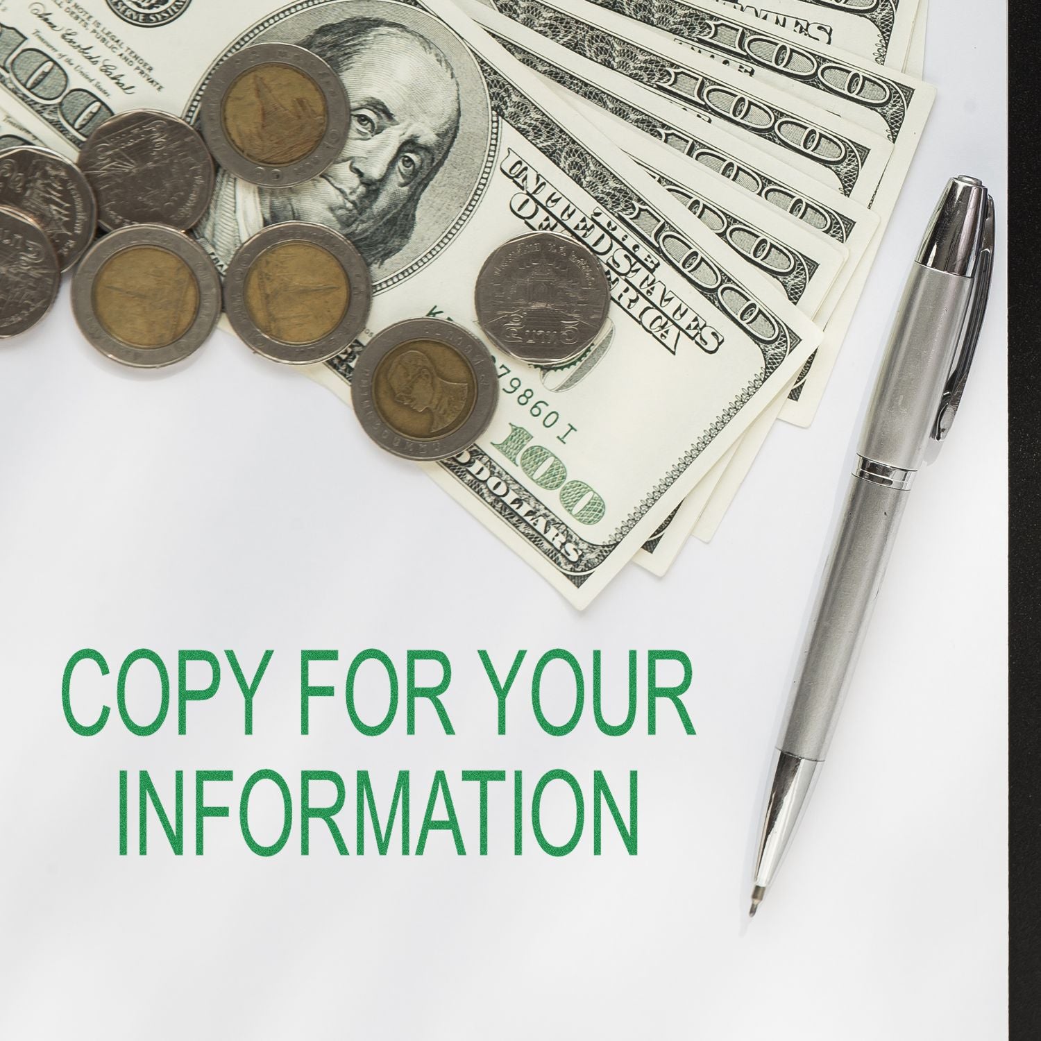 US dollars and coins with a pen and Copy for your information text, illustrating financial copy or documentation.