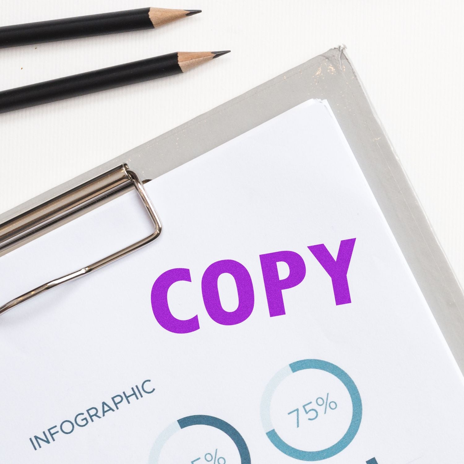 Copywriting concept image: pencils on an infographic page, showing planning for marketing copy and content creation.