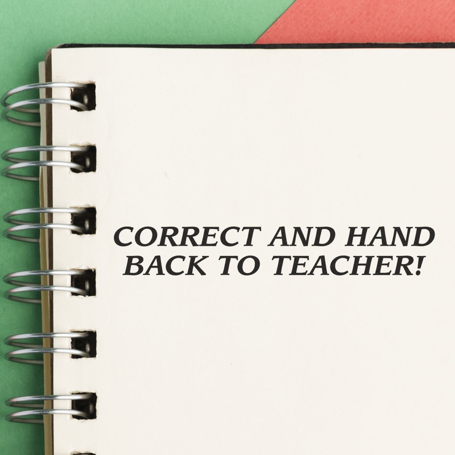 Spiral notebook page reading Correct and hand back to teacher, classroom feedback checklist for students and educators.