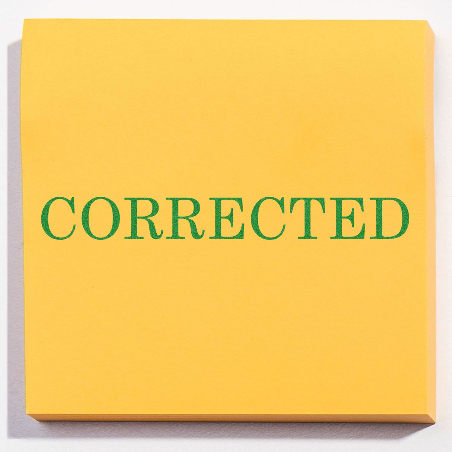 Yellow box with bold green CORRECTED text, marking a corrected version of a product or document.