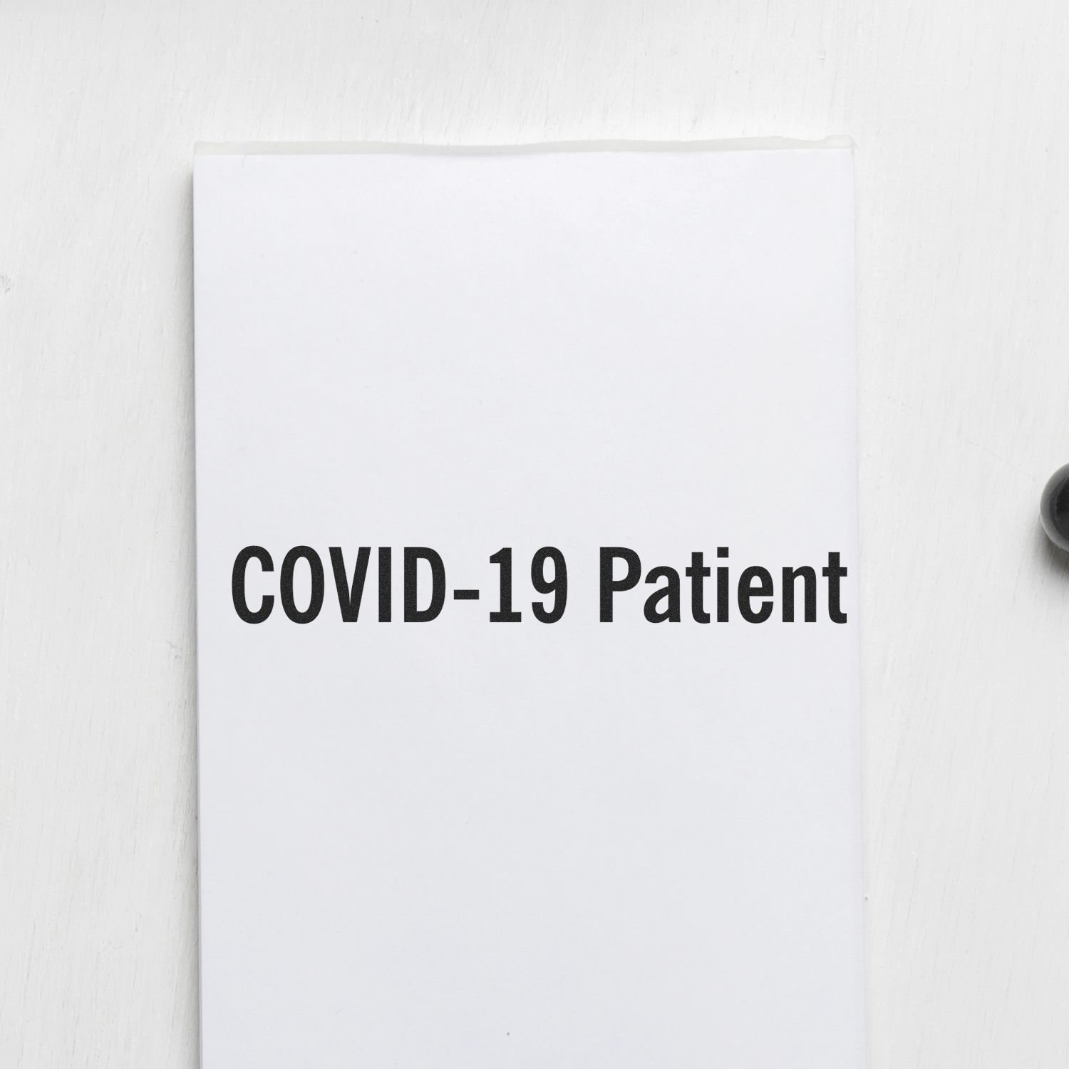 Medical folder cover labeled COVID-19 Patient for managing suspected and confirmed COVID-19 healthcare case records.