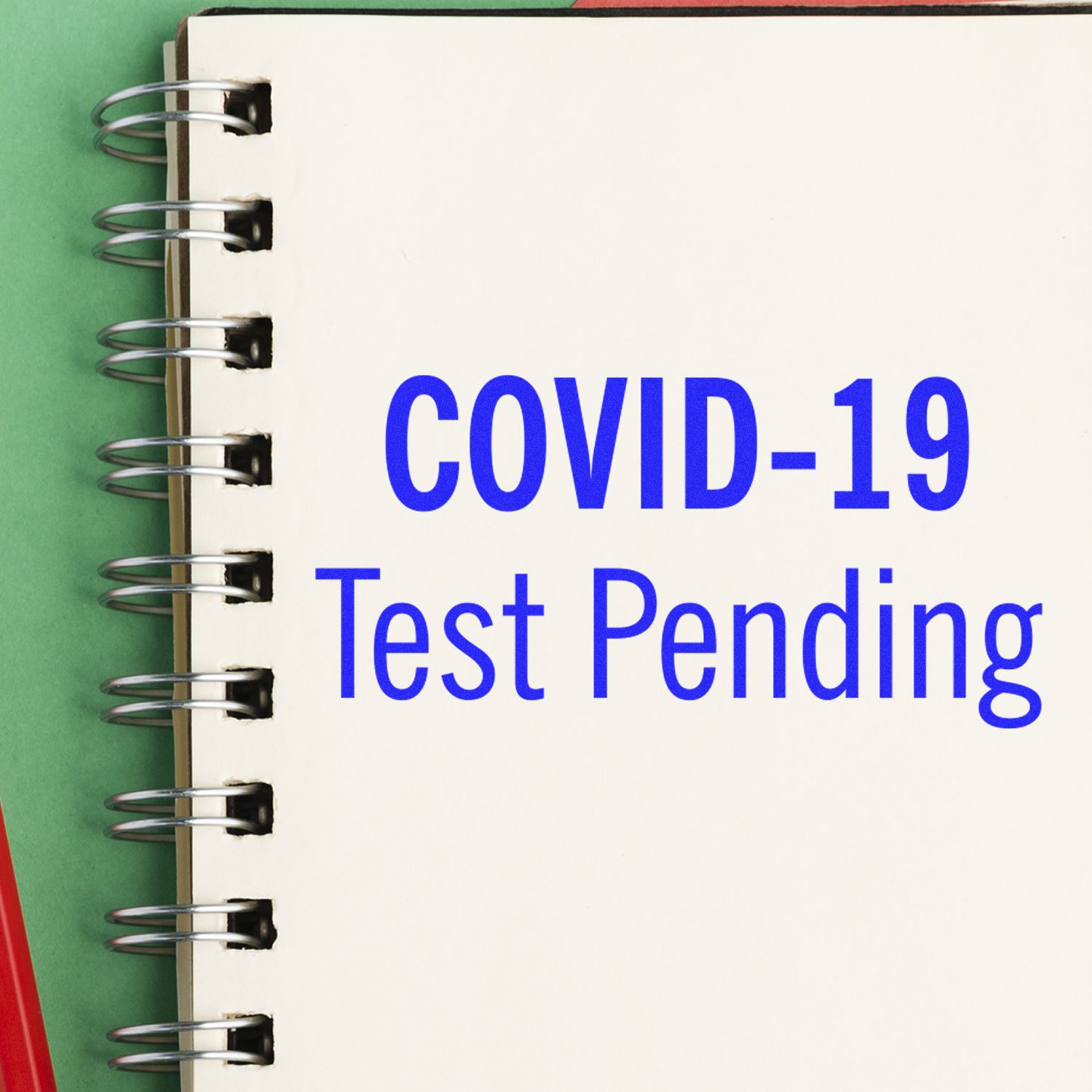 COVID-19 test pending notice on a notebook with clear text for health status updates