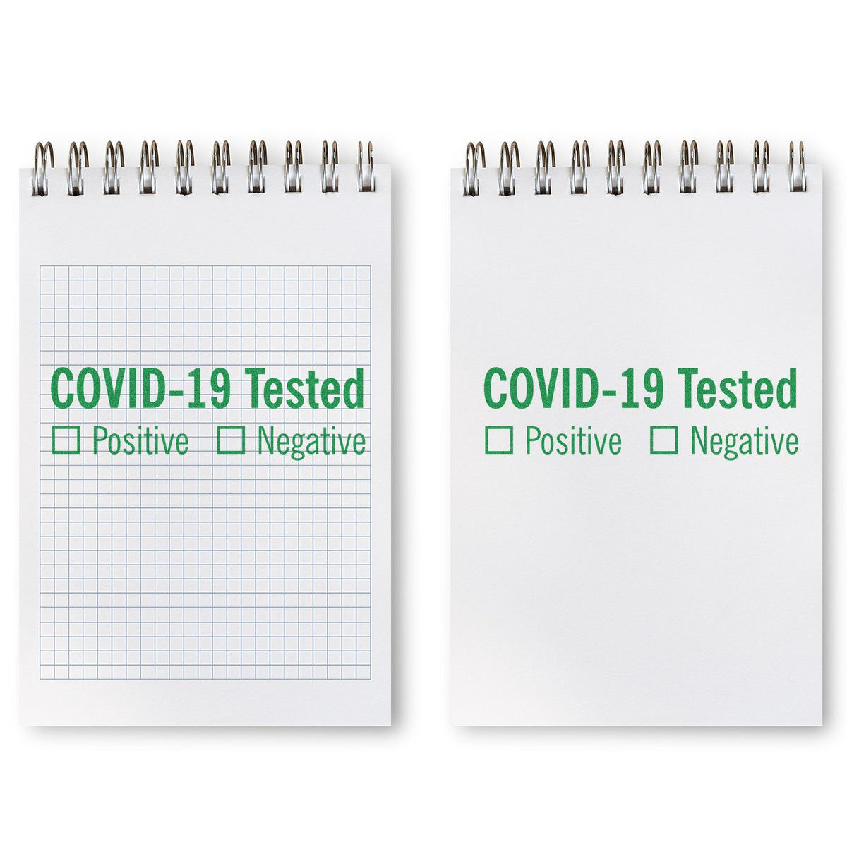 Two white notebooks labeled COVID-19 Tested with positive and negative checkboxes for health screening notes.
