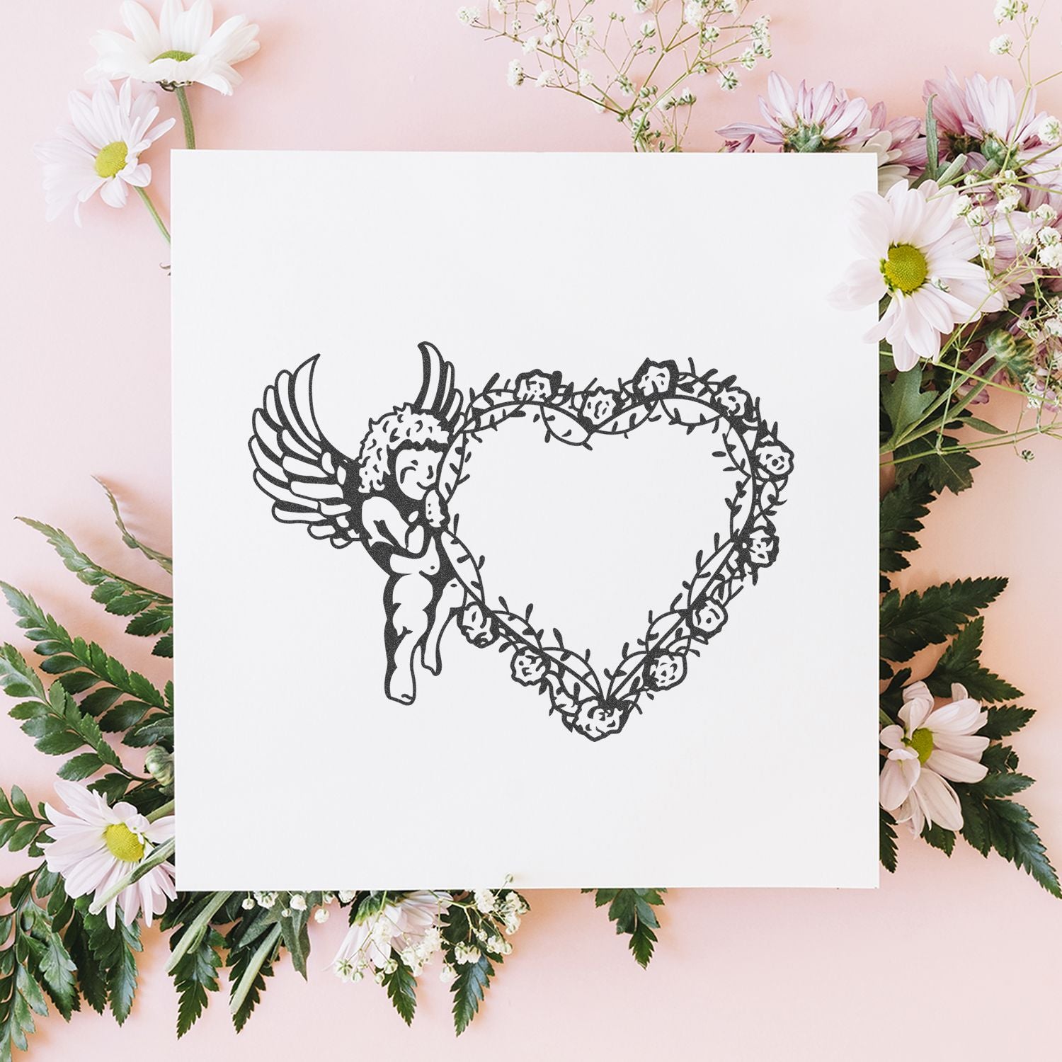 Floral angel heart illustration on white card surrounded by pastel pink daisies and greenery, romantic wedding and Valentines Day design.