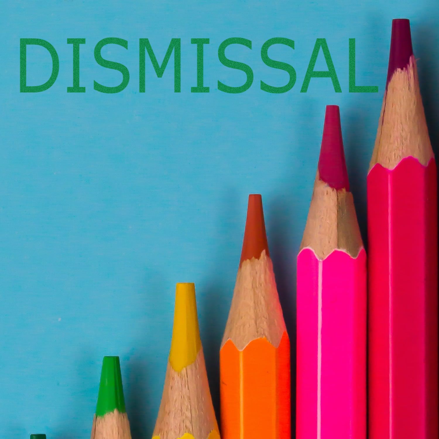 Colorful pencils with the word DISMISSAL on a blue background.