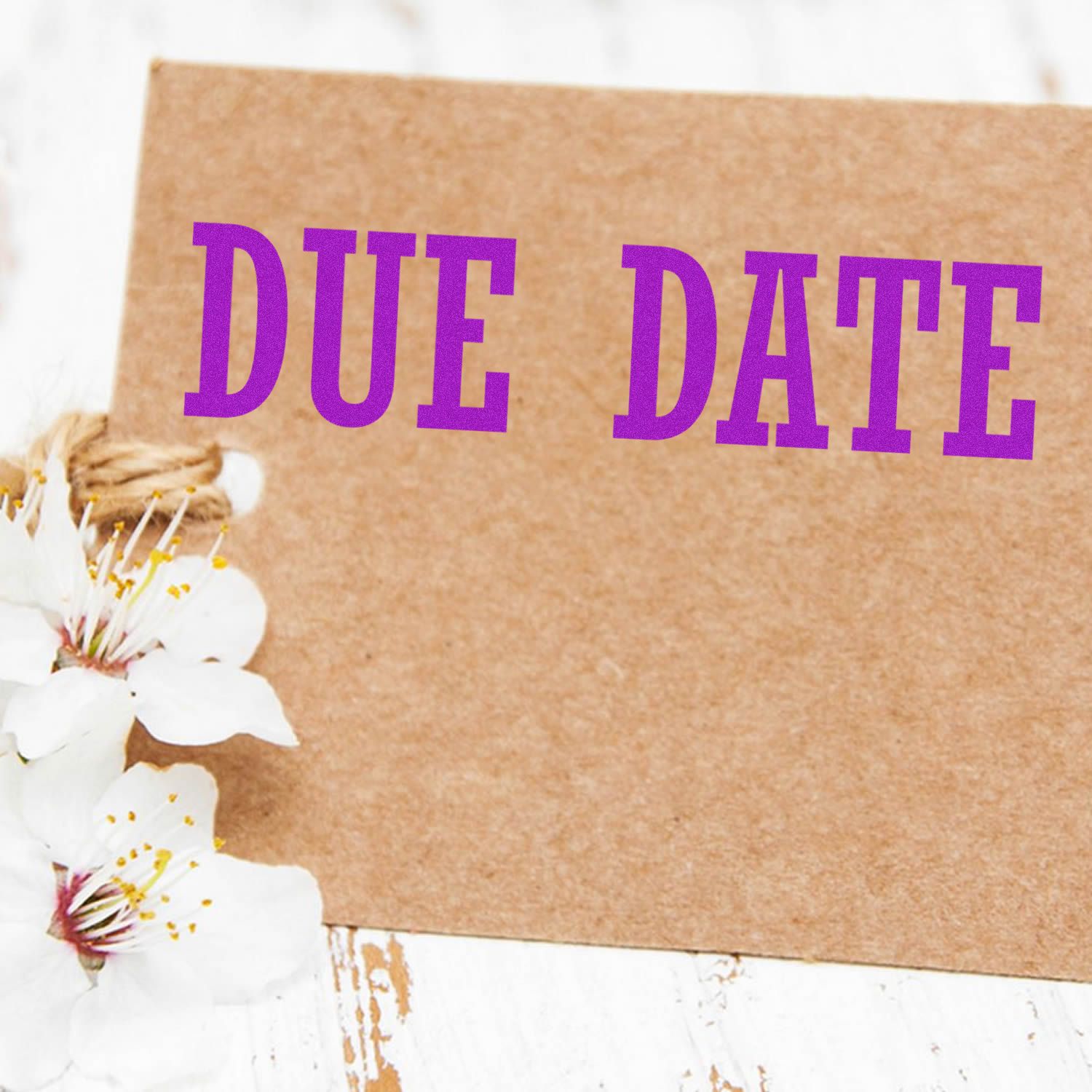 Due date reminder on kraft paper card with purple text and white flowers decorative background