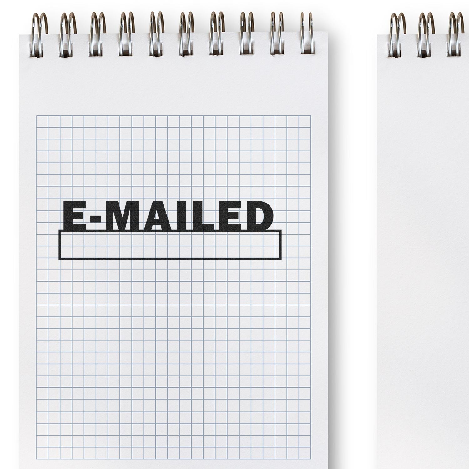 Grid paper notebook with E-MAILED stamp, highlighting emailed messages and email marketing status.