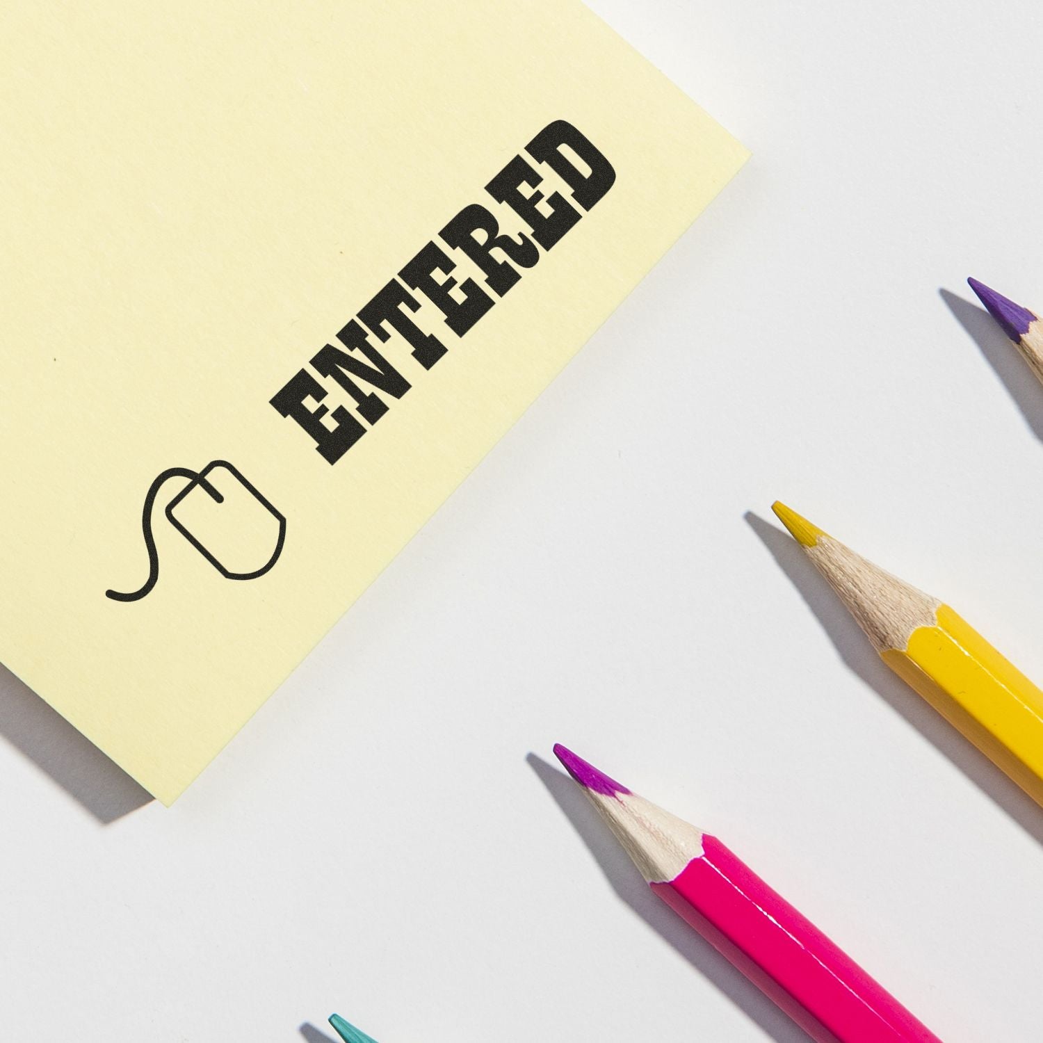 Sticky note reading ENHANCE YOUR MIND with colored pencils, highlighting creativity, learning, and personal development writing prompt.