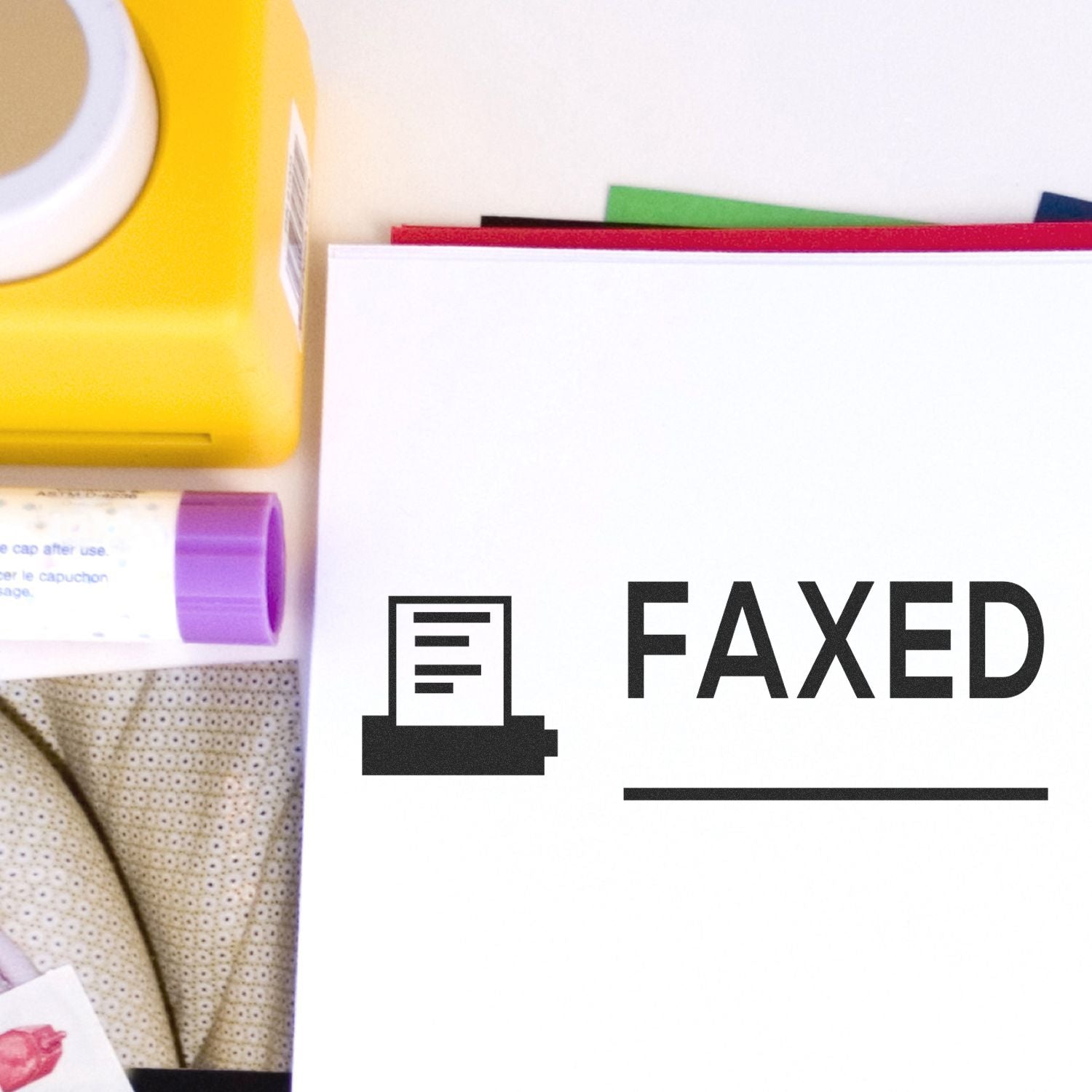 Colored office materials with a bold FAXED stamp and printer icon, indicating documents have been sent via fax service for processing.