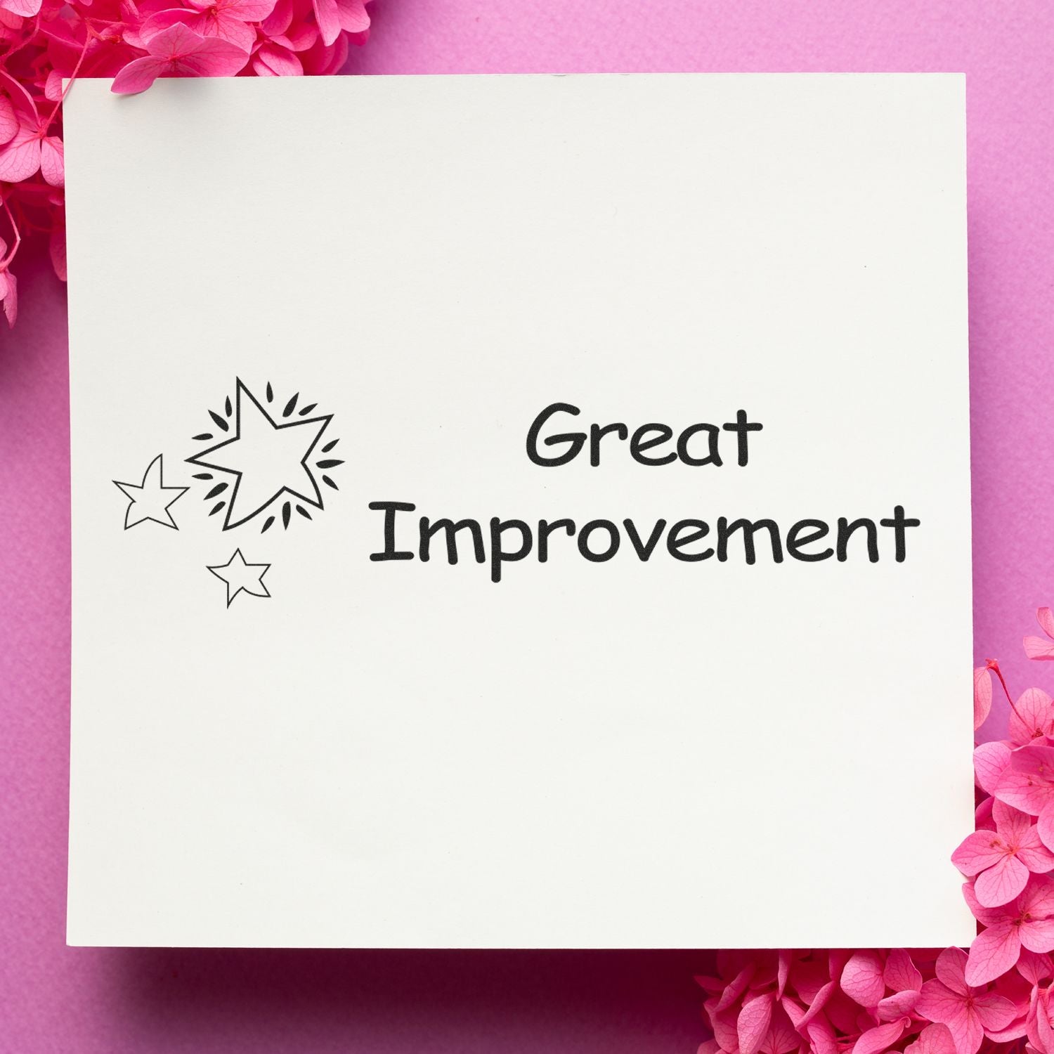Great Improvement typography on white card with pink flowers, motivational greeting for progress and self-improvement.