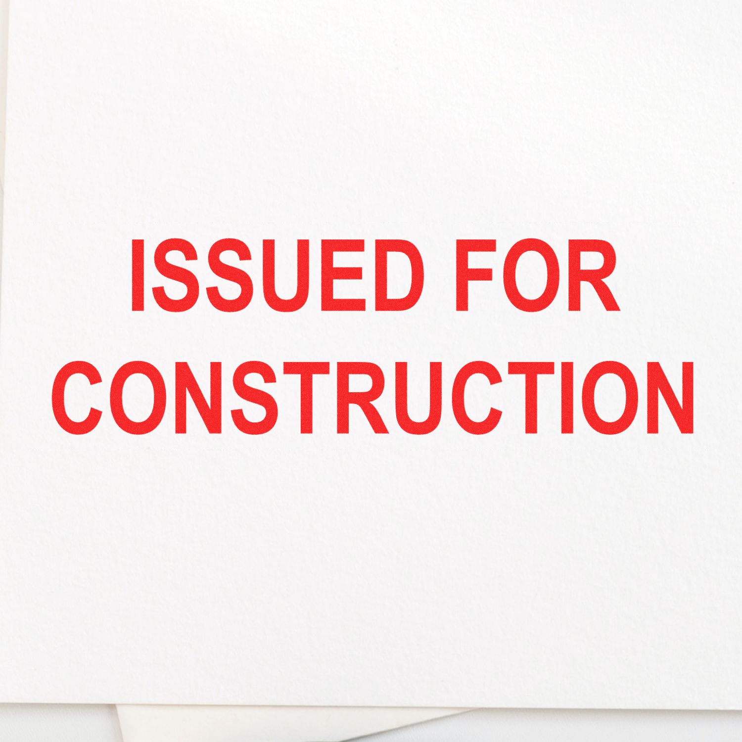 Issued for Construction stamped on white document paper in bold red text.