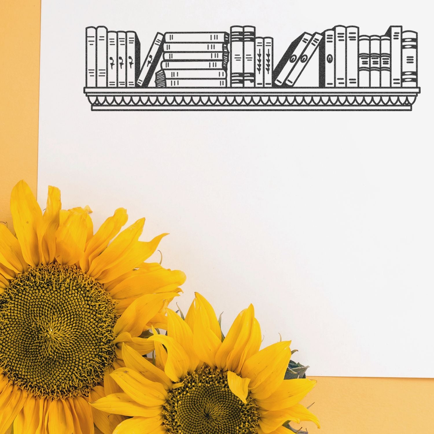 Bright sunflower bouquet with black bookshelf illustration on white paper, floral and creative home decor flat lay.