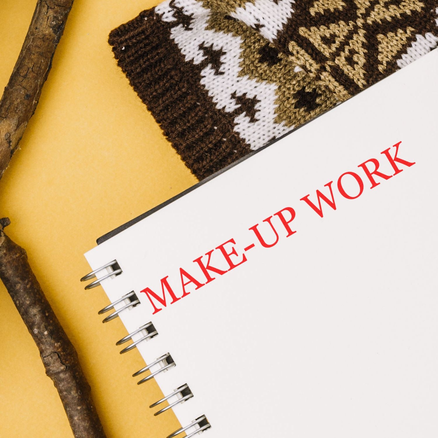 Make-up work title on a notebook page with red text, paired with knitted fabric backdrop for beauty and makeup job theme